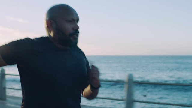 Plus size, running and man run along beach for fitness, training and weight loss journey at sunrise. Runner and guy exercise in nature for wellness, change and sport, goal and body in Mexico