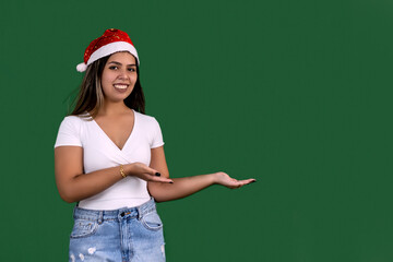 Woman in Santa hat for product demonstration