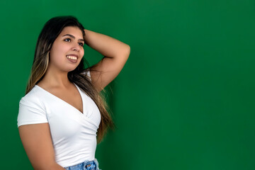 Girl on green background in promotional pose