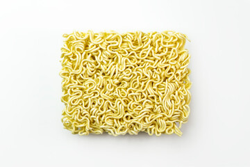 image of briquette of yellow noodles. chinese noodles