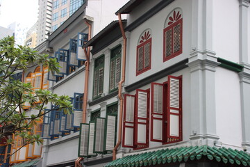 Shuttered windows on old Colonial buildings in Singapore.