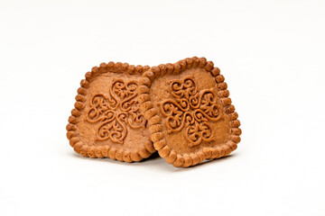 Chocolate color square shaped cookies on a white background
