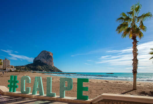 Calpe city word,  beach, palm and mountain- Spain