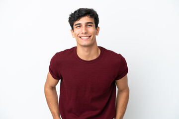 Young Argentinian man isolated on white background laughing