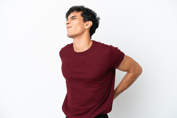 Young Argentinian man isolated on white background suffering from backache for having made an effort