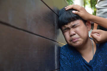 Asian secondary school boy was intimidated by bad habit students at the wall of the bathroom, soft...