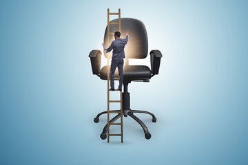 Businessman in the career concept climbing chair