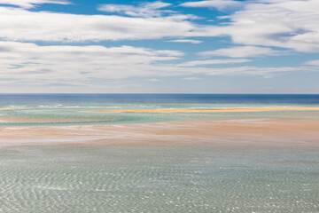 Raudasandur beach or Red Sands beach is a beautiful red beach in a very remote area in the Westfjords of Iceland