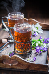 Two glass of green tea in filigrane handle