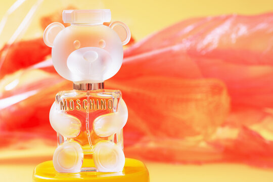 Krichev, Belarus - 14 december 2022: bottle of perfume by Moschino Toy 2 Eau de Parfum  on yellow and red  background