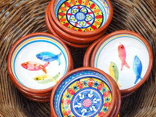 Typical portuguese ceramics in a basket