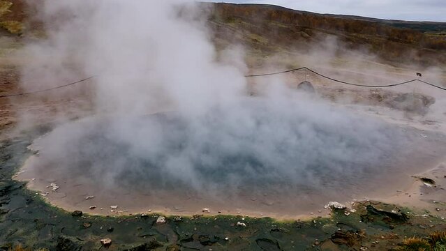 steam comes from geothermal icelandic geyser. slow motion. Namafjall Hverir geothermal area