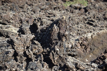 Different shapes of volcanic lava which solidified on Lanzarote Island 200 years ago, rocks, lava, photographed in November 2022, lava chimney, lava tunnel