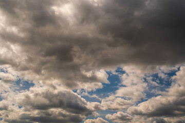 panorama of black sky background with storm clouds. thunder front