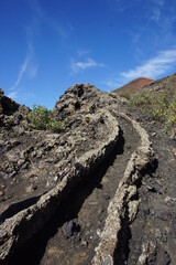 Different shapes of volcanic lava which solidified on Lanzarote Island 200 years ago, rocks, lava, photographed in November 2022, lava chimney, lava tunnel