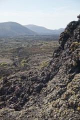 Different shapes of volcanic lava which solidified on Lanzarote Island 200 years ago, rocks, lava, photographed in November 2022, lava chimney, lava tunnel