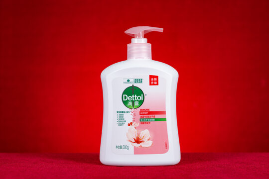 ZHONGSHAN GUANGDONG China-December 17,2022:a bottle of Dettol hand wash on a red background horizontal composition.
