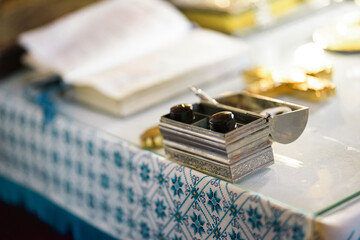 A metal box with religious objects for the rite of anointing.