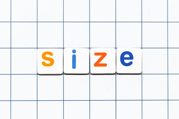 Colorful tile letter in word size on white grid background