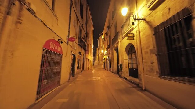 narrow street in the town Montpellier during the night 