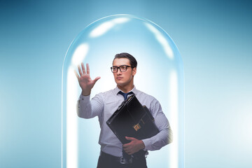 Business people trapped in transparent glass