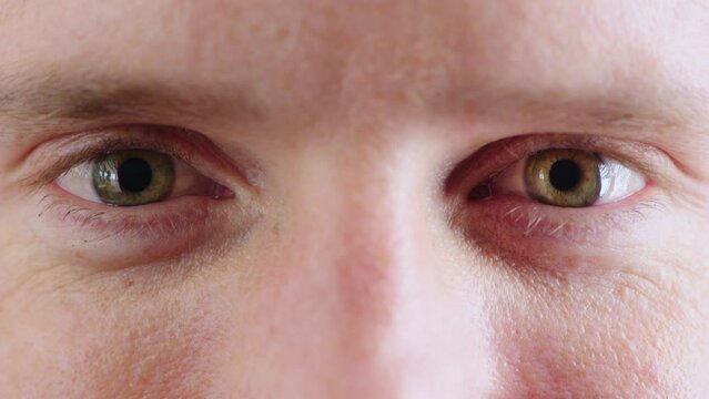 Eyes, biometrics and closeup of a man for cybersecurity and facial recognition details. Macro, eyeball and male with vision for ocular wellness and surveillance for anatomy perception and awareness