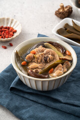 Delicious Taiwanese peeled green chili pepper chicken soup with mushroom and goji berry