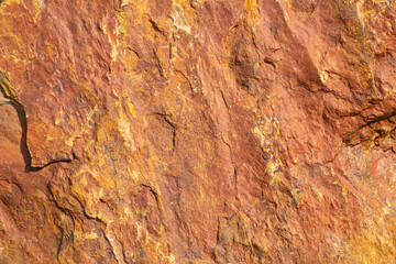 Rusty Orange color stone texture Background. Decorative Rock stone textures.