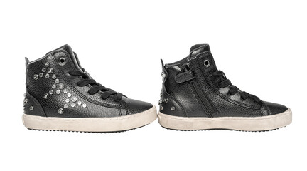 Stylish black leather sneakers on a white background.