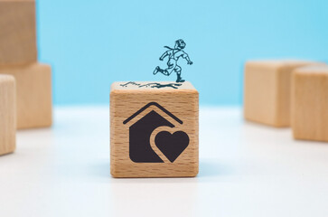 aids orphans day concept represented by icons on wooden cube blocks.
on blue background with copy...