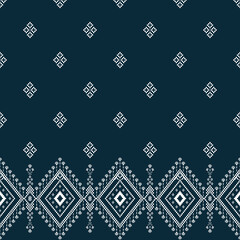 Fototapeta premium Blue cross stitch traditional ethnic pattern paisley flower Ikat background abstract Aztec African Indonesian Indian seamless pattern for fabric print cloth dress carpet curtains and sarong