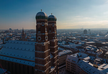 Snow-capped Frauenkirche in Munich, Germany