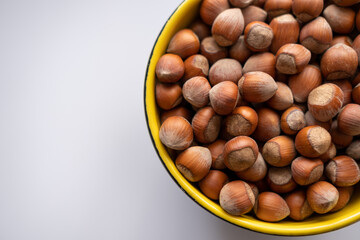 Nuts in the bowl, Nuts in the bowl and empty text space, top view.