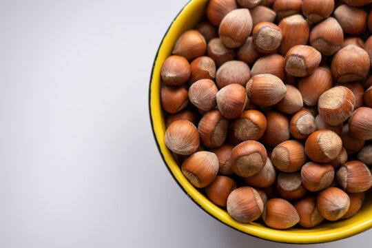 Nuts in the bowl, Nuts in the bowl and empty text space, top view.