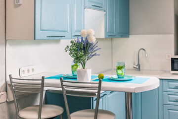 bar counter in the kitchen in the apartment stylish serving for two glasses with mojito
