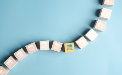 Store or Franchise, business growth and logistics concept. Wooden cubes with store icon, difference in business.