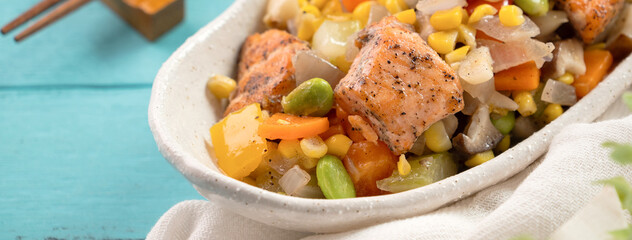 Fresh salmon cube with stir-fried mixed vegetables.