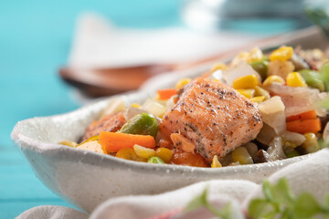 Fresh salmon cube with stir-fried mixed vegetables.