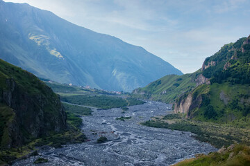 Fototapeta na wymiar Georgian military road, Caucasus mountains. Beautiful mountainous area with a river.