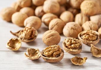 walnuts on a white kitchen table, selective focus.