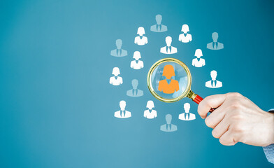 HRM or HRM magnifying glass highlighting the Manager's Icon, one of the employee icons for leading organizations in recruitment and job search.