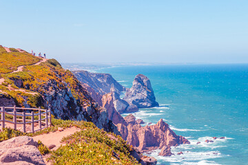 Cabo da roca, stunning views on blue turquoise ocean and purple rocks