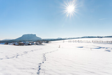 winter landscape with snow and footsteps in Saxonian Switzerland