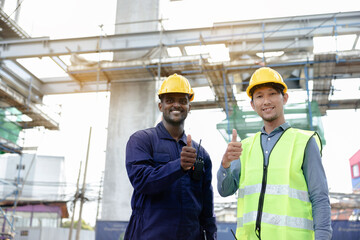 Team Construction worker standing with thumbs up Show confidence in working professionally. Great work and success in planning the work of the team. employment contract agreement