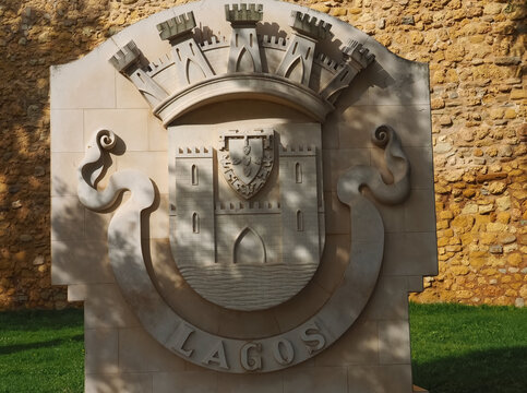 Coat of arms sculpture at the castle of Lagos at the Algarve coast of Portugal