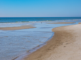 Calm blue sky summer  day on the Gulf of Mexico beach on St George Island in the panhandle or Forgotten Coast area of Florida in the United States