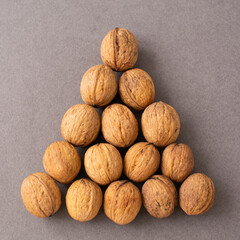 The shape of the Christmas tree of their fresh walnuts. New Year