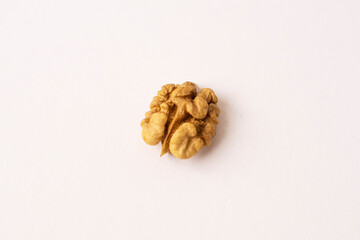 Walnut kernels on a white background. Peeled walnut