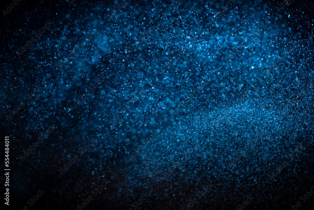 Canvas Prints abstract real blue dust particles on black background. glittering sparkling bokeh overlay design wit