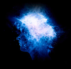 Face seen from the side. Brain problems. Degenerative disease. Bipolar disorder, illness, concept, double personality, schizophrenia. Thoughts and voices. Cloud effect particles. Creativity and ideas.